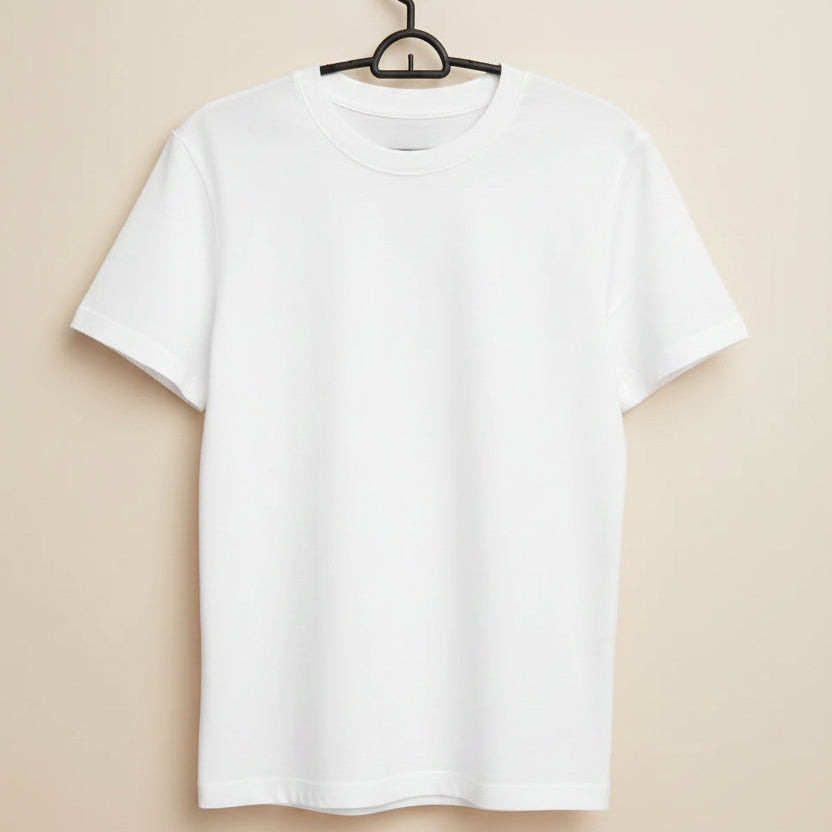 White t-shirt on a hanger against a dark background