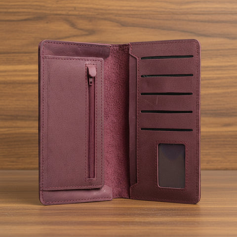 Open maroon wallet with card slots and a zipper pocket on a white background