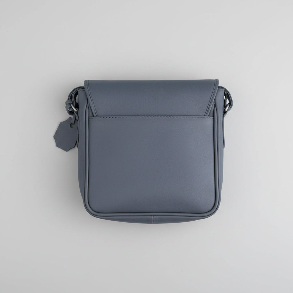Gray leather crossbody bag on a white background