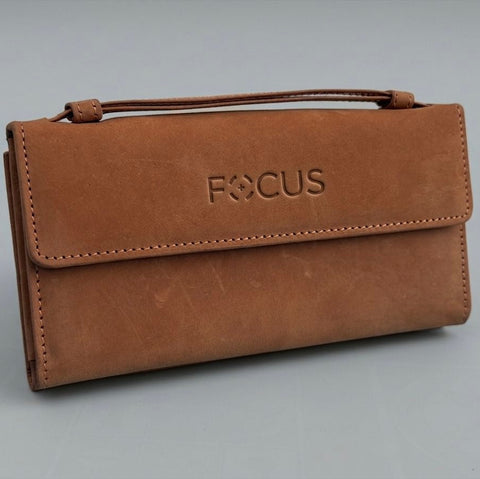 Brown leather wallet with 'FOCUS' branding on a gray background