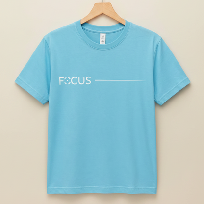 Blue t-shirt with 'FOCUS' text on a hanger against a gray background