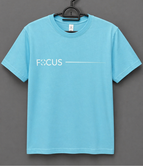 Blue t-shirt with 'FOCUS' text on a hanger against a gray background